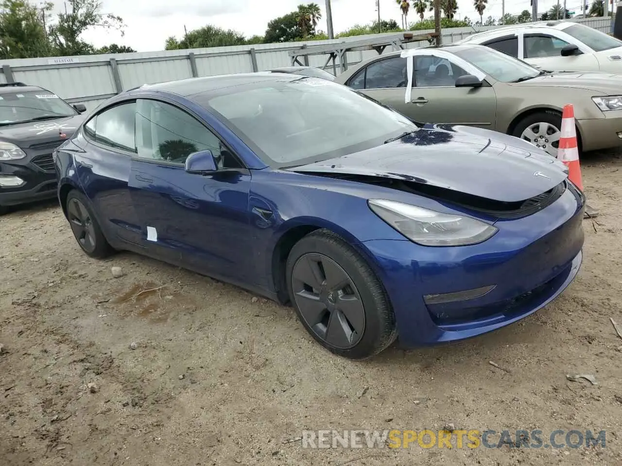 4 Photograph of a damaged car 5YJ3E1EB5NF334399 TESLA MODEL 3 2022