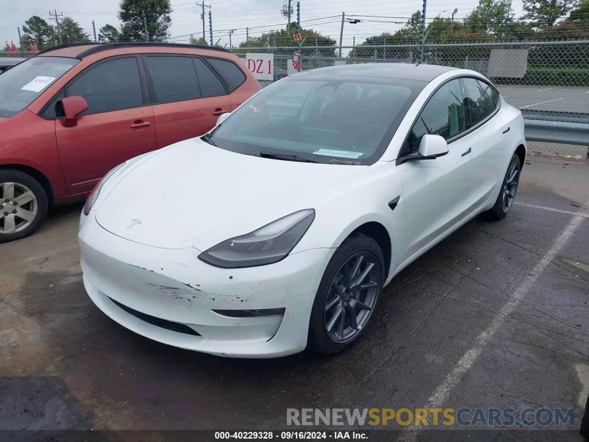 2 Photograph of a damaged car 5YJ3E1EB5NF339229 TESLA MODEL 3 2022