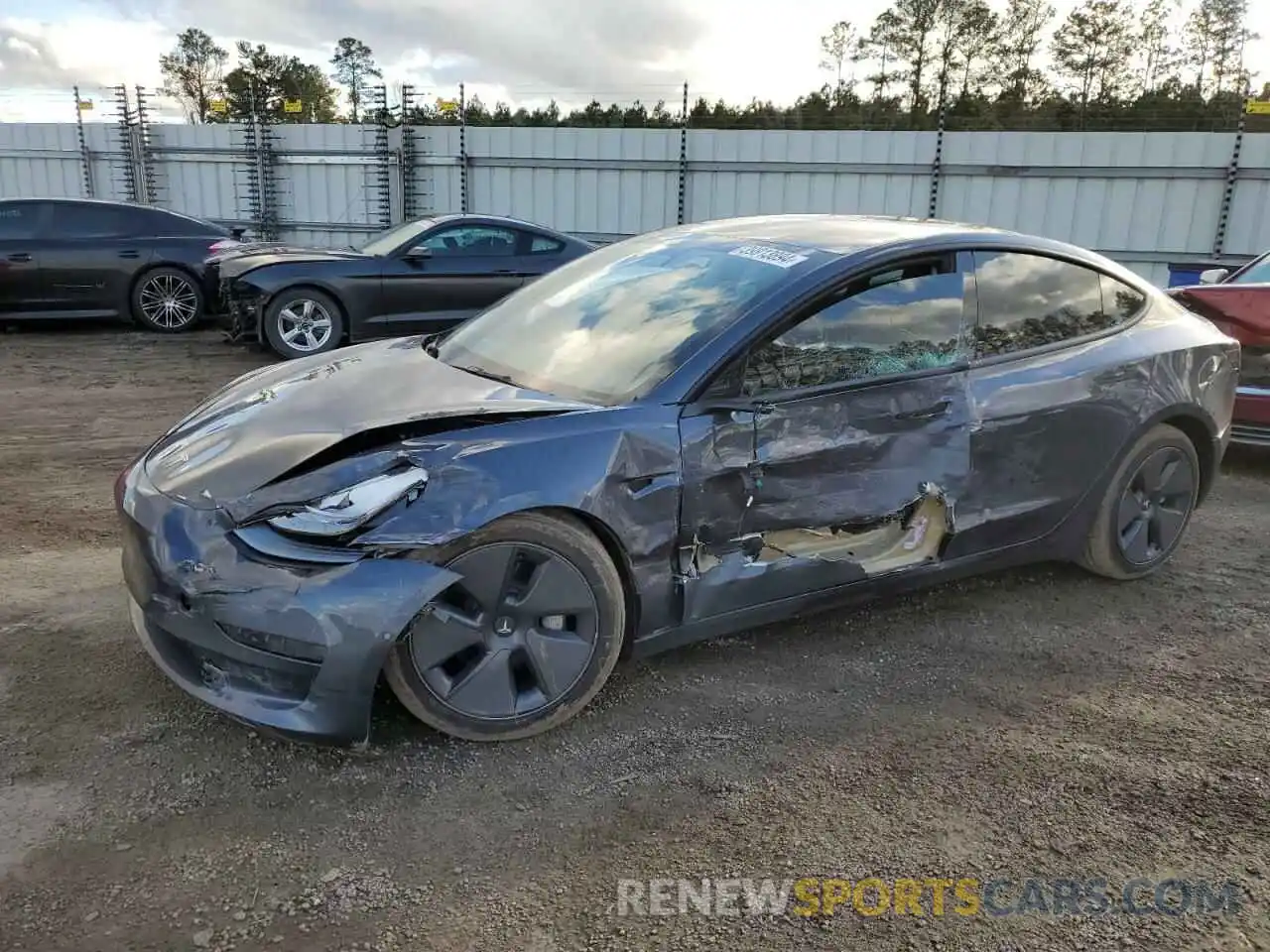 1 Photograph of a damaged car 5YJ3E1EB5NF341143 TESLA MODEL 3 2022