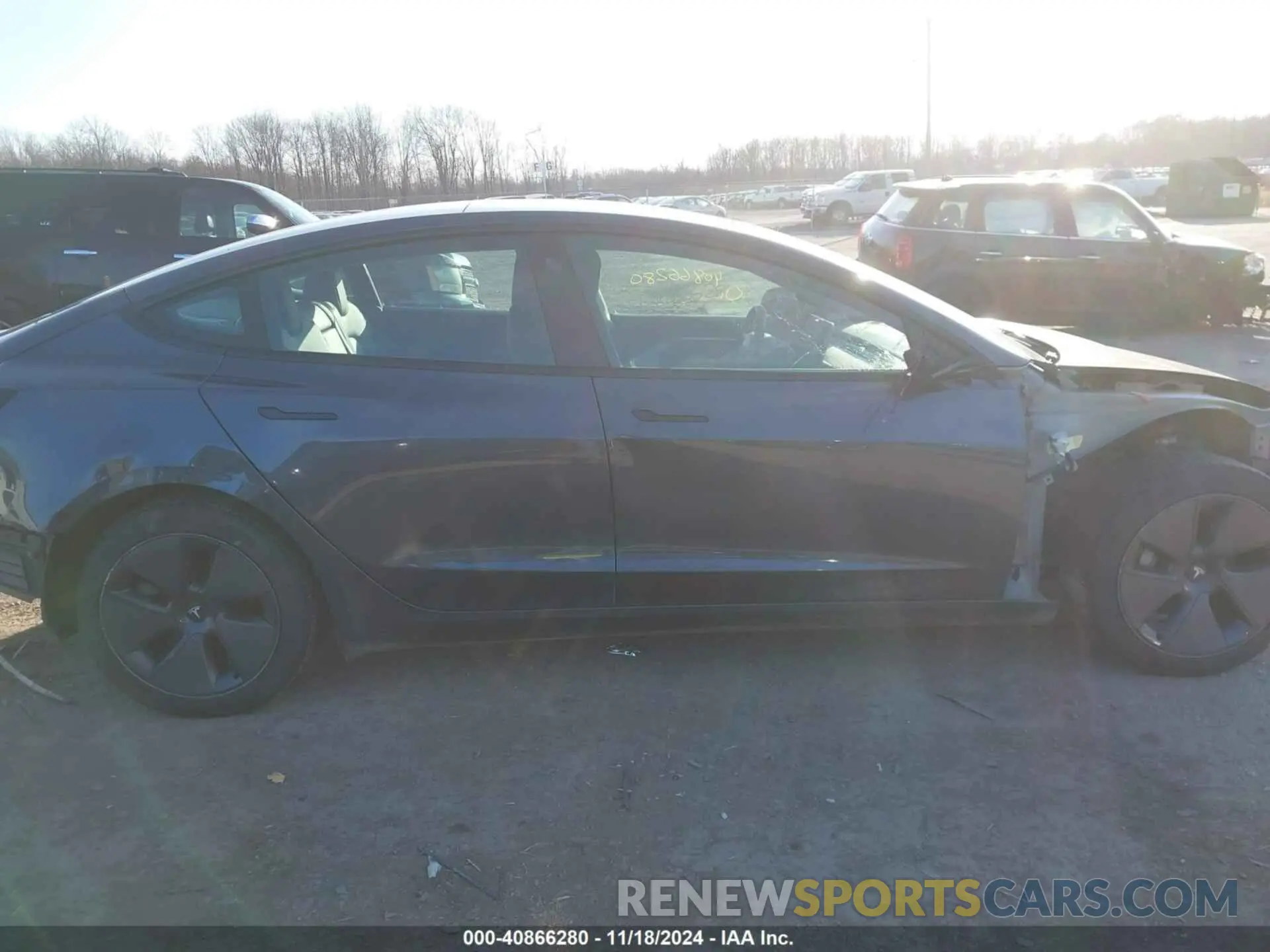 14 Photograph of a damaged car 5YJ3E1EB6NF117069 TESLA MODEL 3 2022