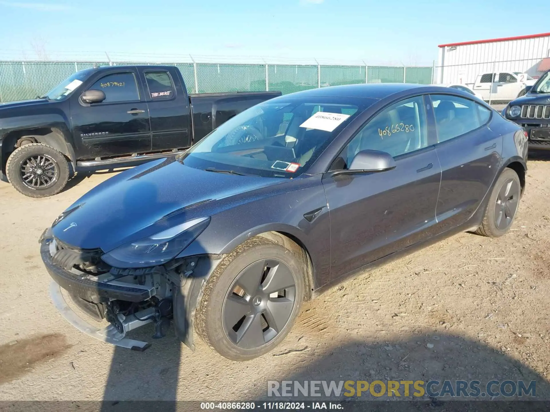 2 Photograph of a damaged car 5YJ3E1EB6NF117069 TESLA MODEL 3 2022