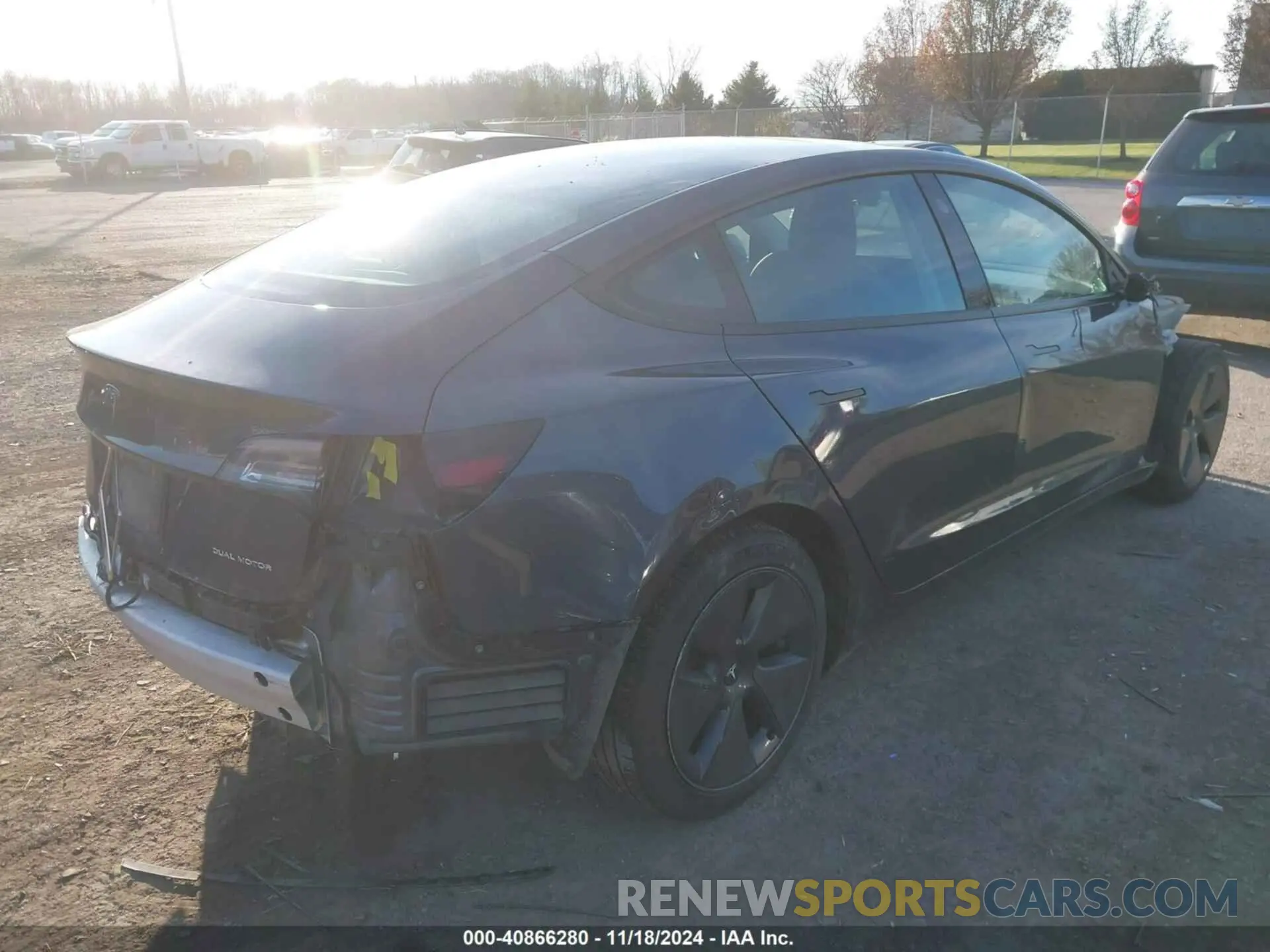 4 Photograph of a damaged car 5YJ3E1EB6NF117069 TESLA MODEL 3 2022