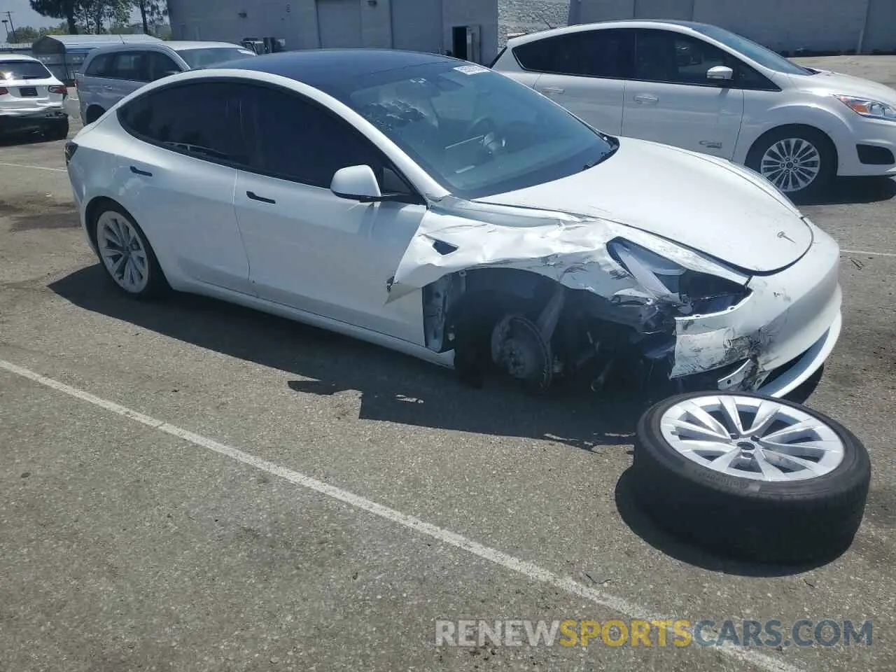 4 Photograph of a damaged car 5YJ3E1EB6NF127326 TESLA MODEL 3 2022