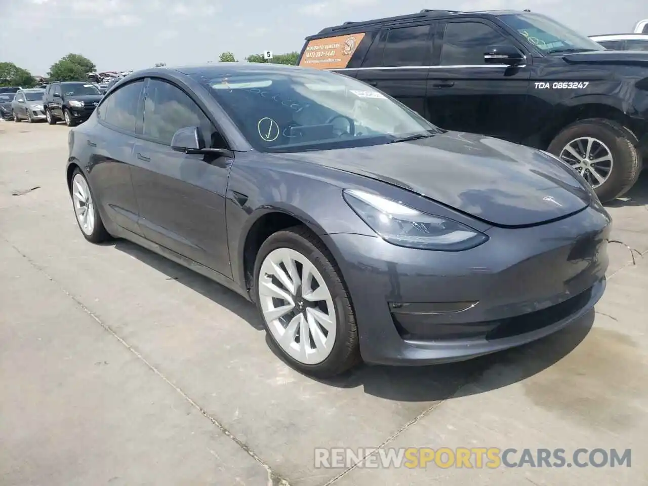 1 Photograph of a damaged car 5YJ3E1EB6NF127357 TESLA MODEL 3 2022