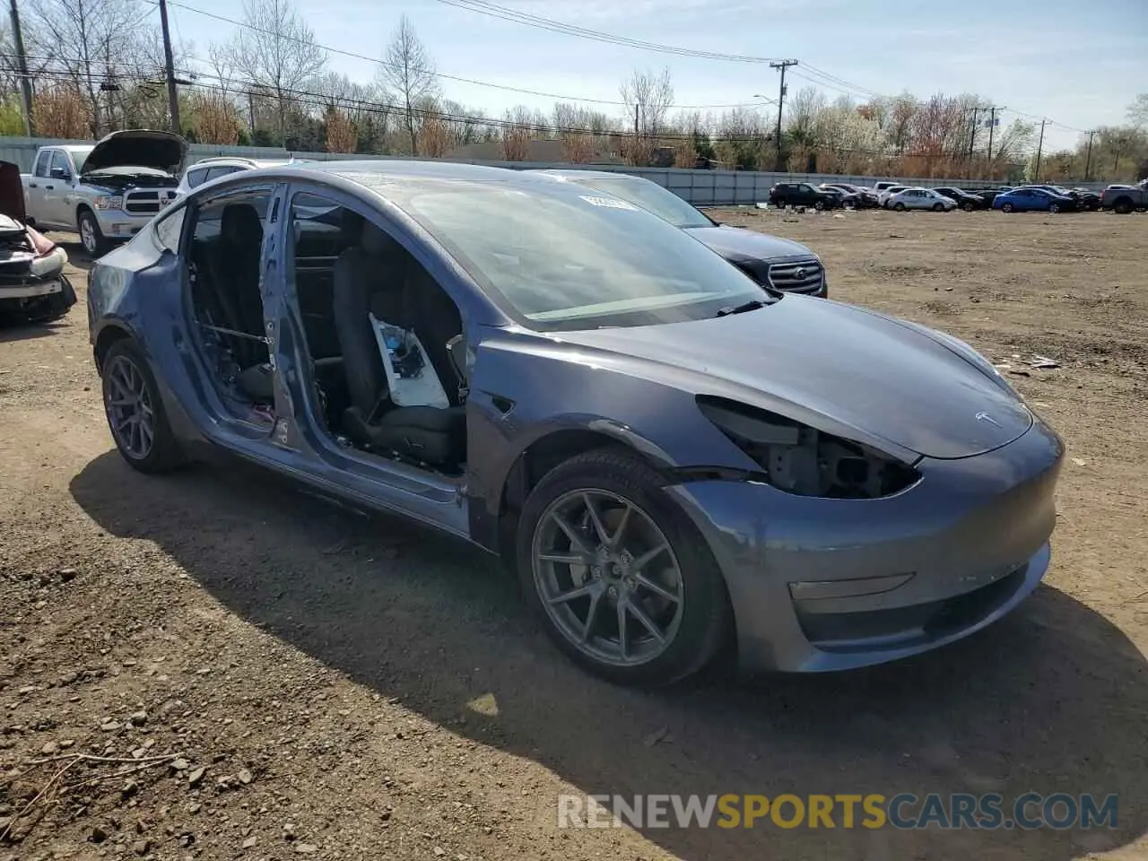 4 Photograph of a damaged car 5YJ3E1EB6NF178423 TESLA MODEL 3 2022