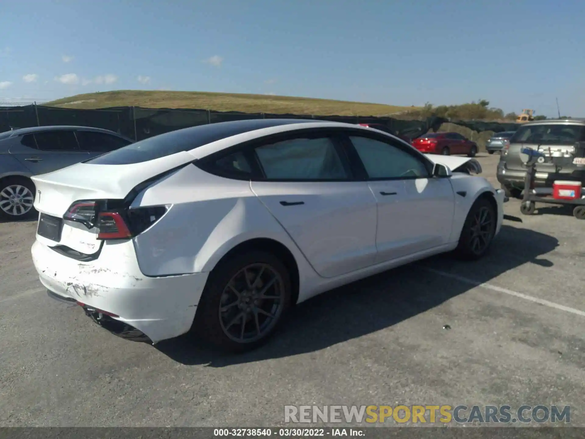 4 Photograph of a damaged car 5YJ3E1EB6NF178616 TESLA MODEL 3 2022