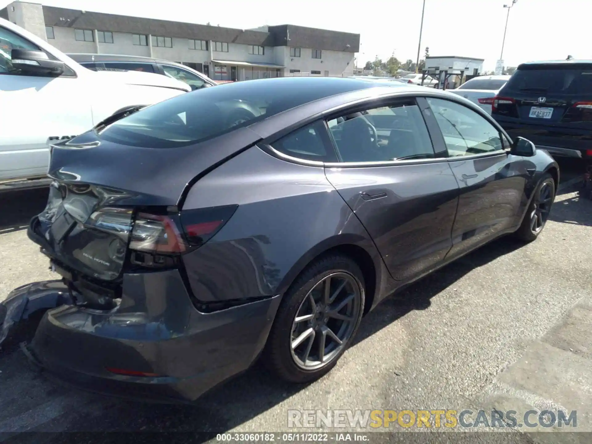 4 Photograph of a damaged car 5YJ3E1EB6NF180155 TESLA MODEL 3 2022