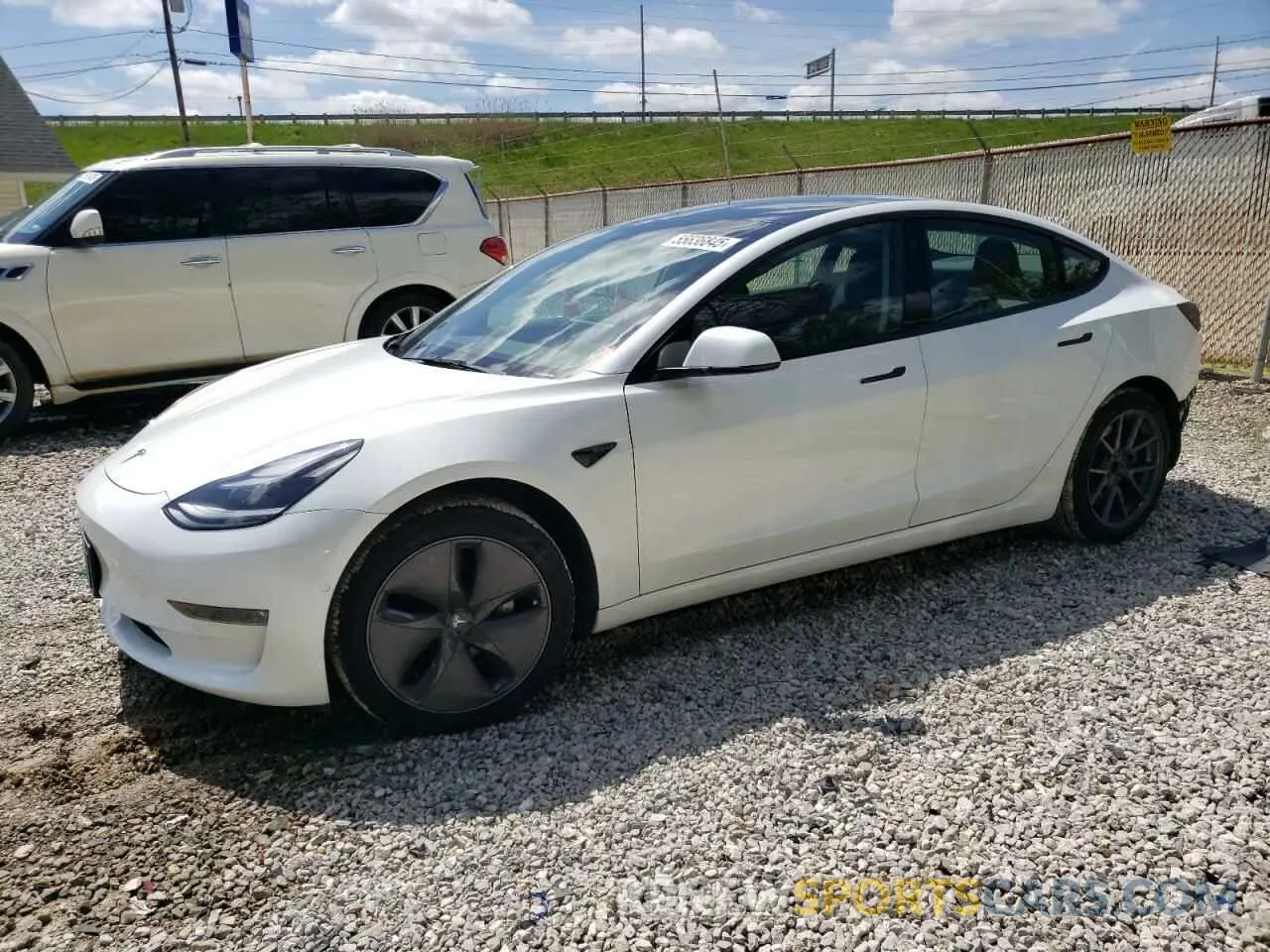 1 Photograph of a damaged car 5YJ3E1EB6NF184352 TESLA MODEL 3 2022