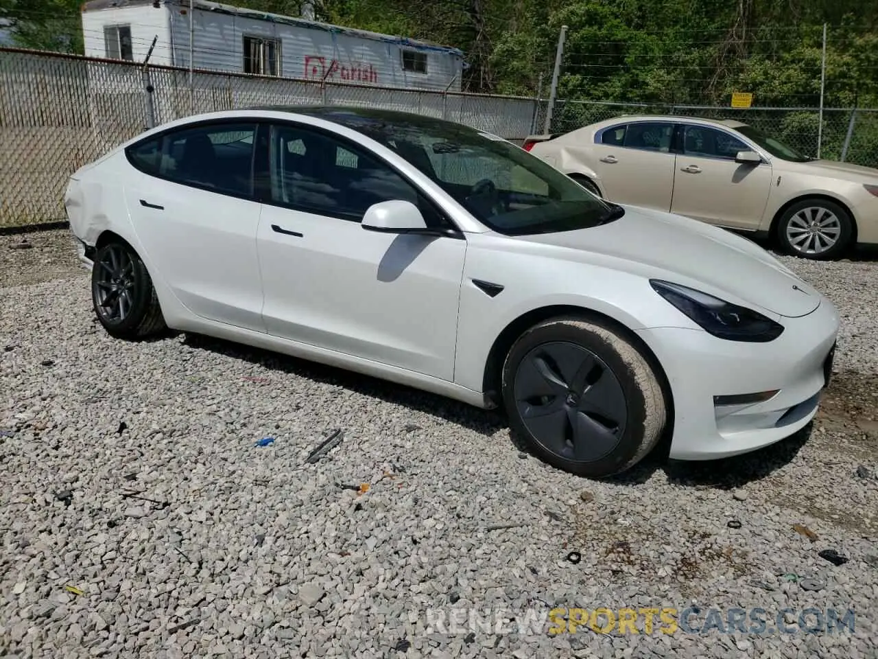 4 Photograph of a damaged car 5YJ3E1EB6NF184352 TESLA MODEL 3 2022