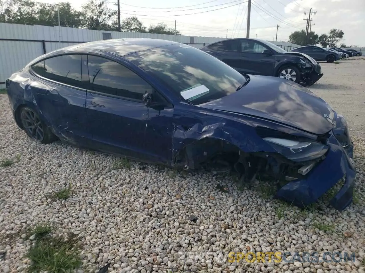 4 Photograph of a damaged car 5YJ3E1EB6NF194041 TESLA MODEL 3 2022