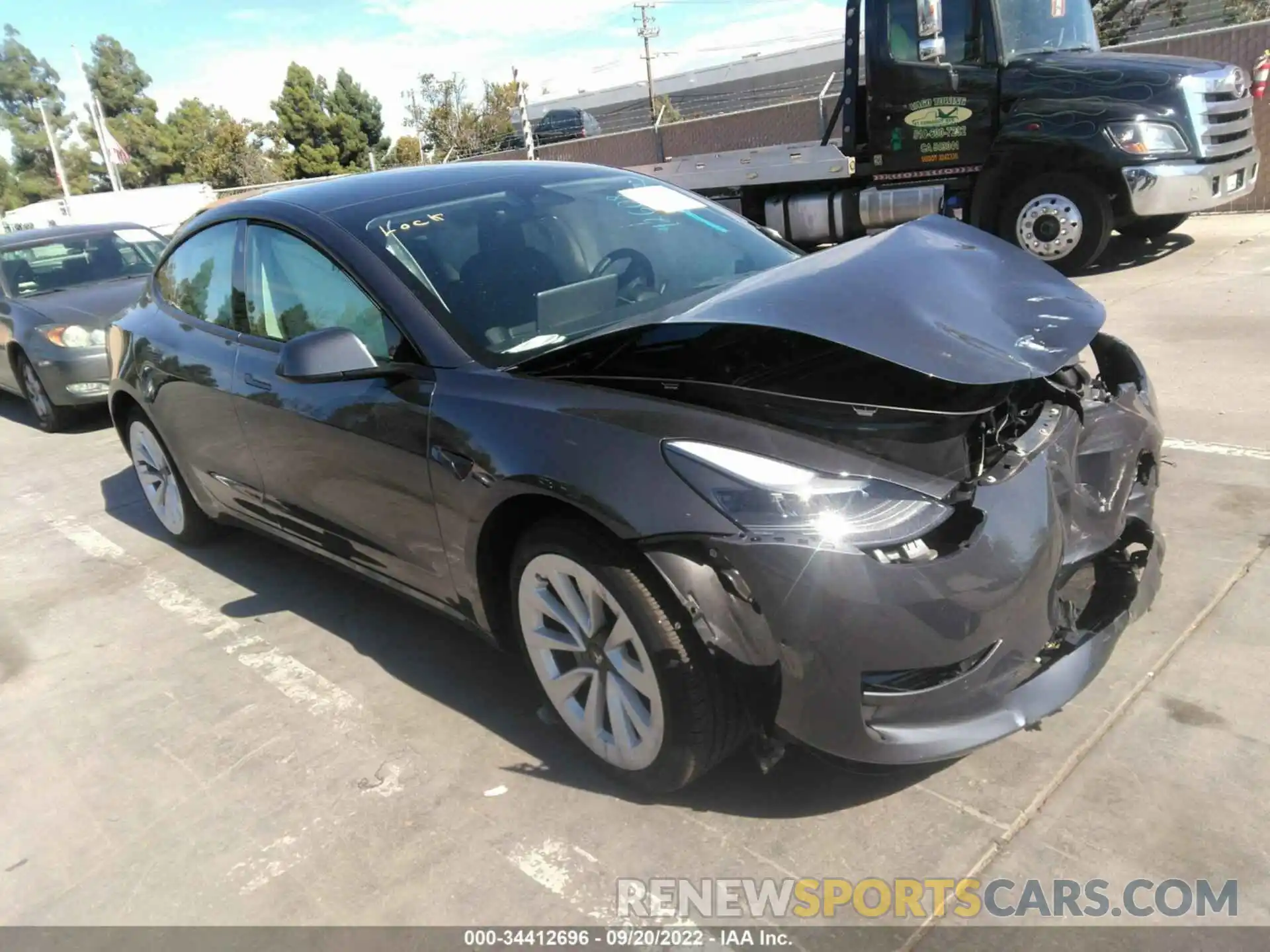 1 Photograph of a damaged car 5YJ3E1EB6NF209203 TESLA MODEL 3 2022