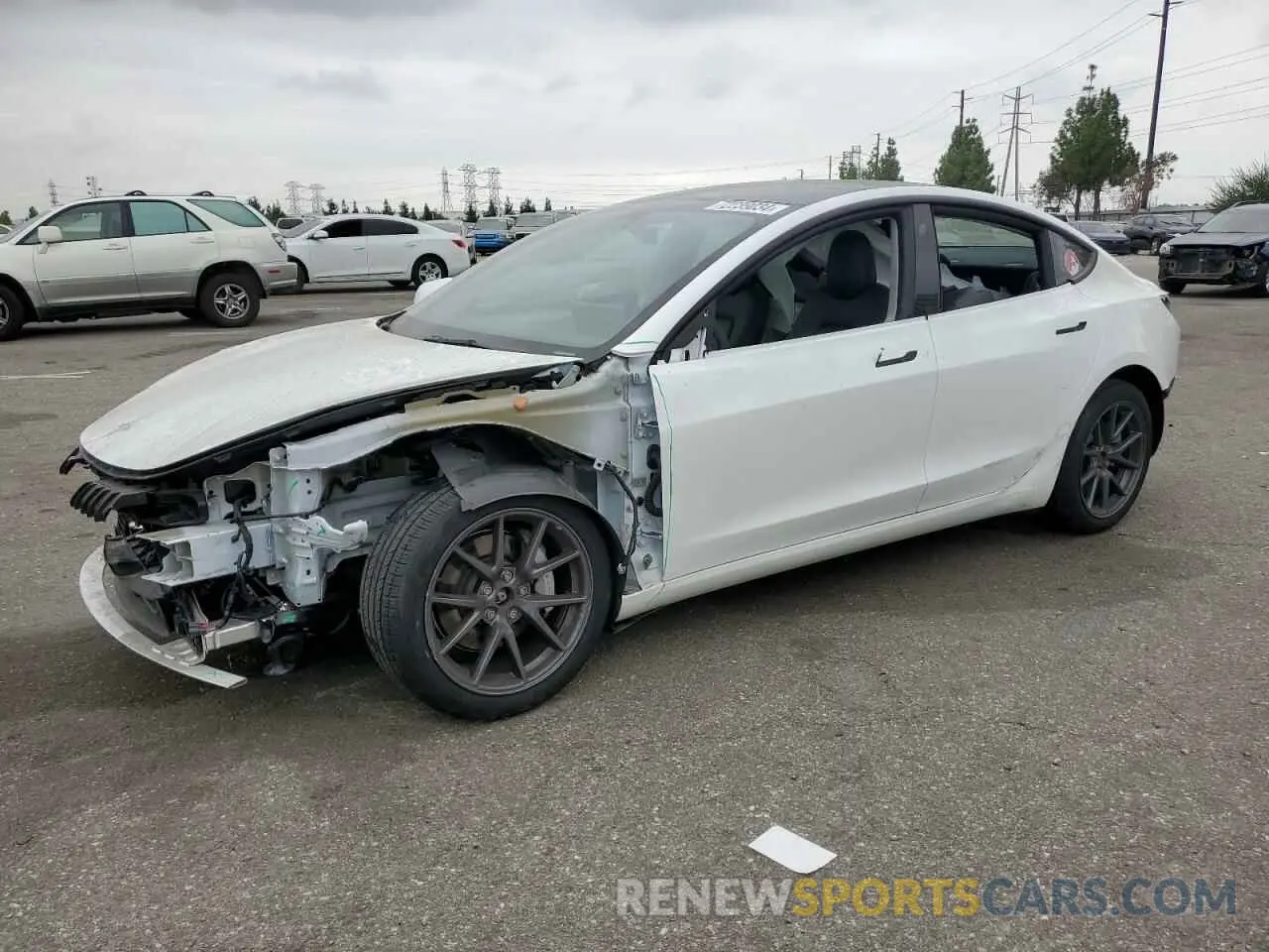 1 Photograph of a damaged car 5YJ3E1EB6NF212750 TESLA MODEL 3 2022