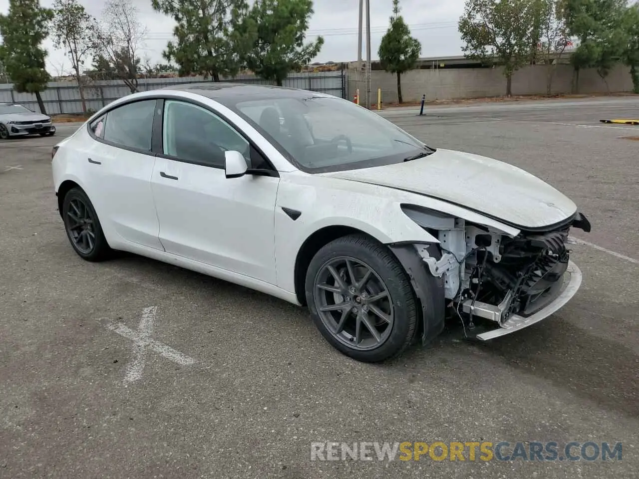 4 Photograph of a damaged car 5YJ3E1EB6NF212750 TESLA MODEL 3 2022