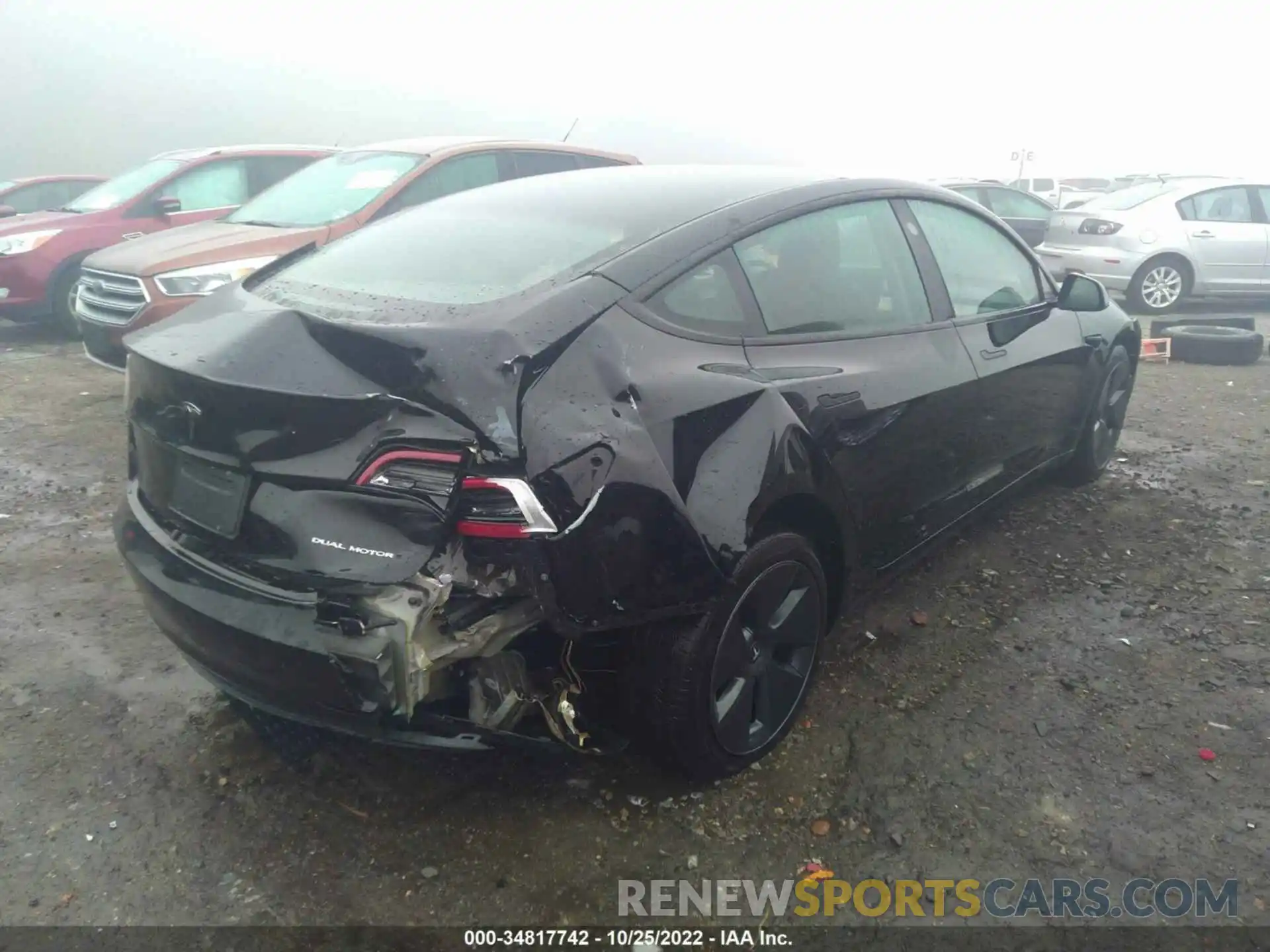 4 Photograph of a damaged car 5YJ3E1EB6NF261723 TESLA MODEL 3 2022