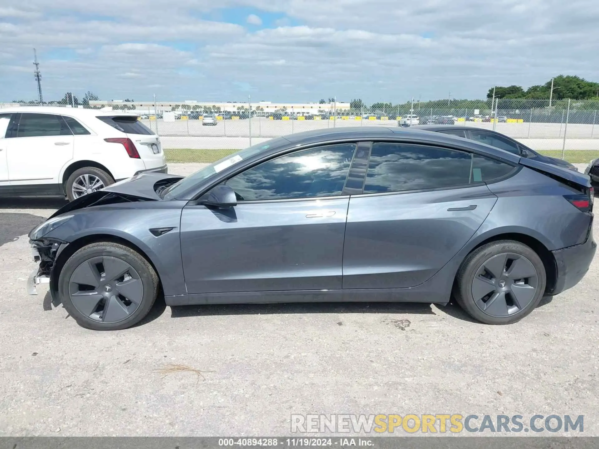 14 Photograph of a damaged car 5YJ3E1EB6NF264489 TESLA MODEL 3 2022