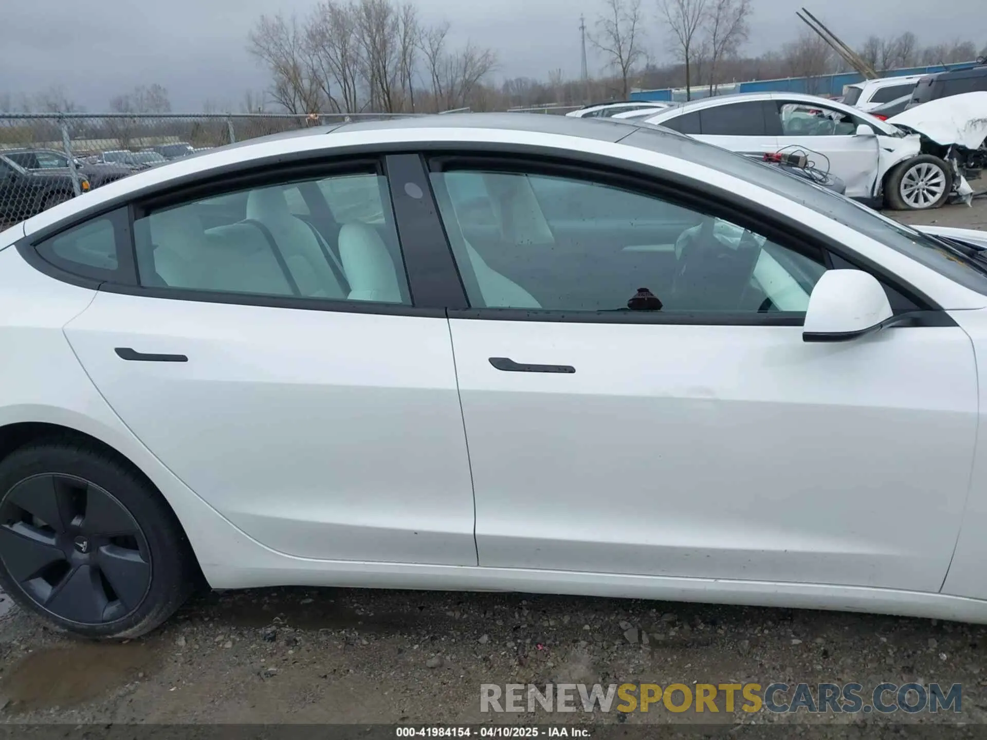 12 Photograph of a damaged car 5YJ3E1EB6NF272009 TESLA MODEL 3 2022