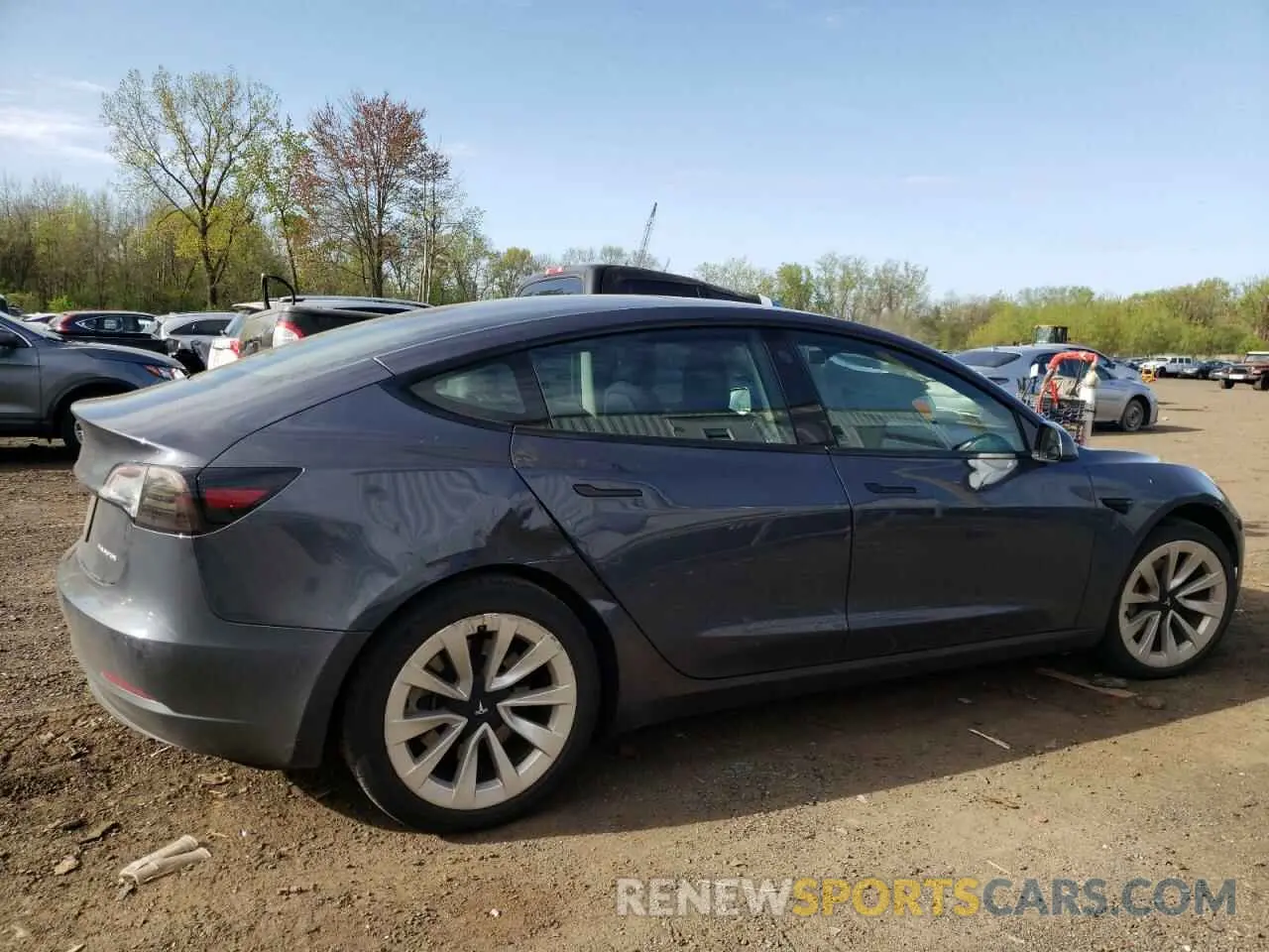 3 Photograph of a damaged car 5YJ3E1EB6NF290946 TESLA MODEL 3 2022