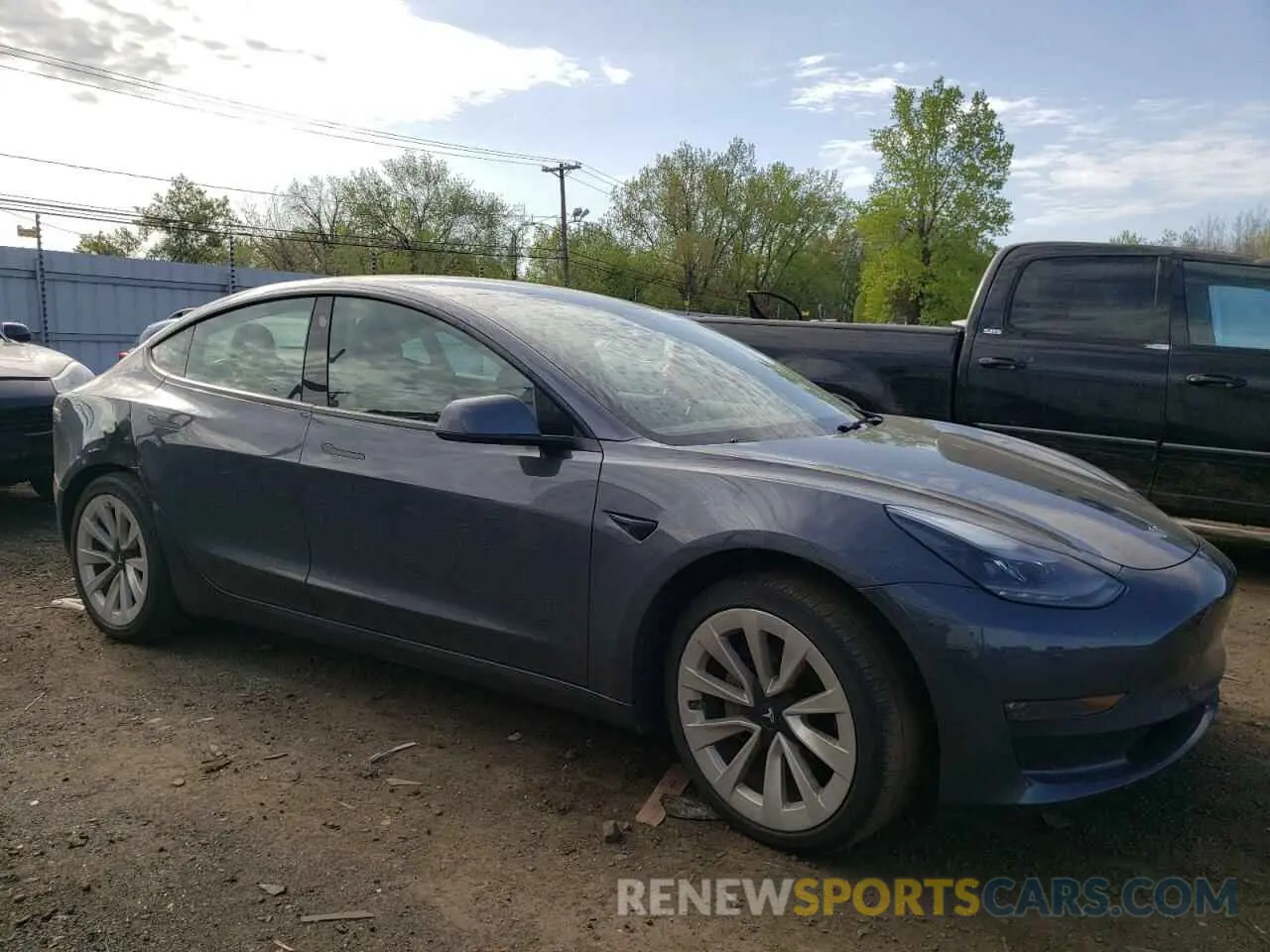 4 Photograph of a damaged car 5YJ3E1EB6NF290946 TESLA MODEL 3 2022