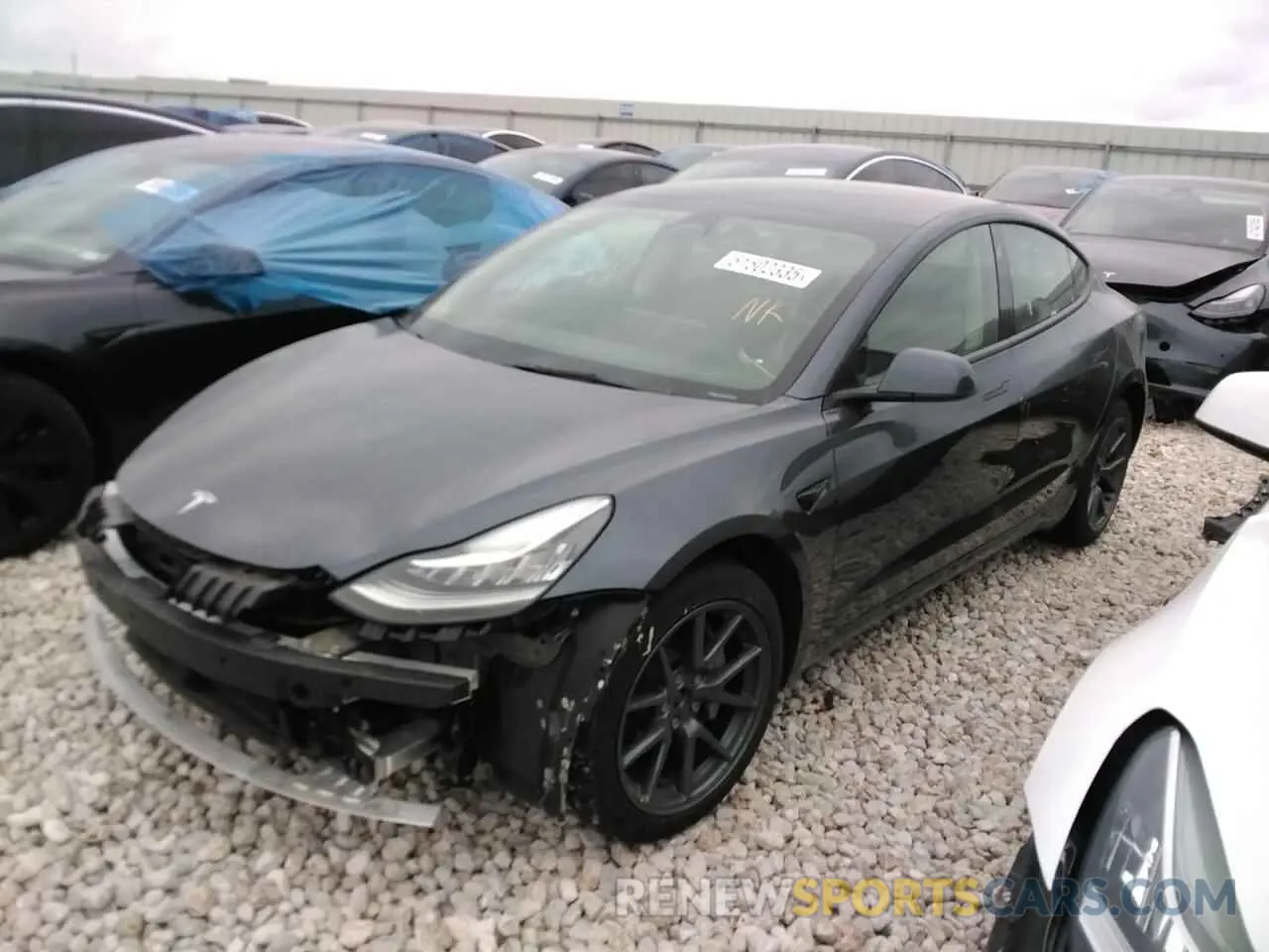 1 Photograph of a damaged car 5YJ3E1EB6NF297038 TESLA MODEL 3 2022