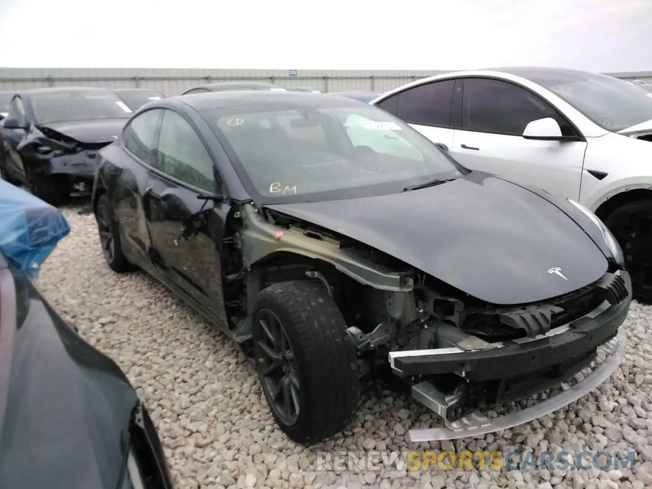 4 Photograph of a damaged car 5YJ3E1EB6NF297038 TESLA MODEL 3 2022
