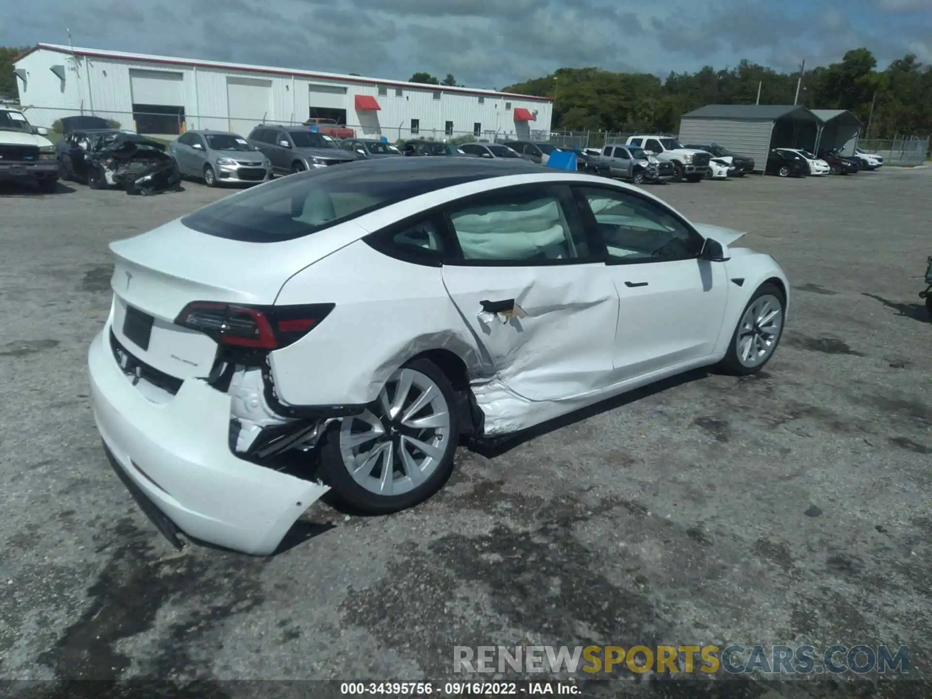 4 Photograph of a damaged car 5YJ3E1EB6NF337098 TESLA MODEL 3 2022