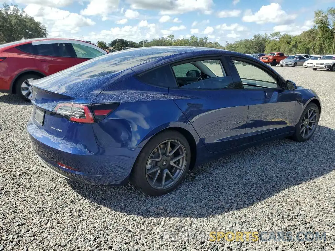3 Photograph of a damaged car 5YJ3E1EB7NF103357 TESLA MODEL 3 2022
