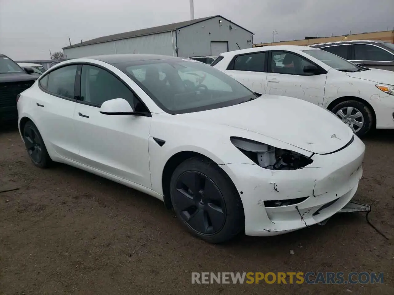 4 Photograph of a damaged car 5YJ3E1EB7NF108087 TESLA MODEL 3 2022