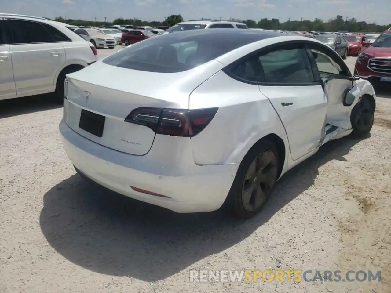 4 Photograph of a damaged car 5YJ3E1EB7NF130218 TESLA MODEL 3 2022