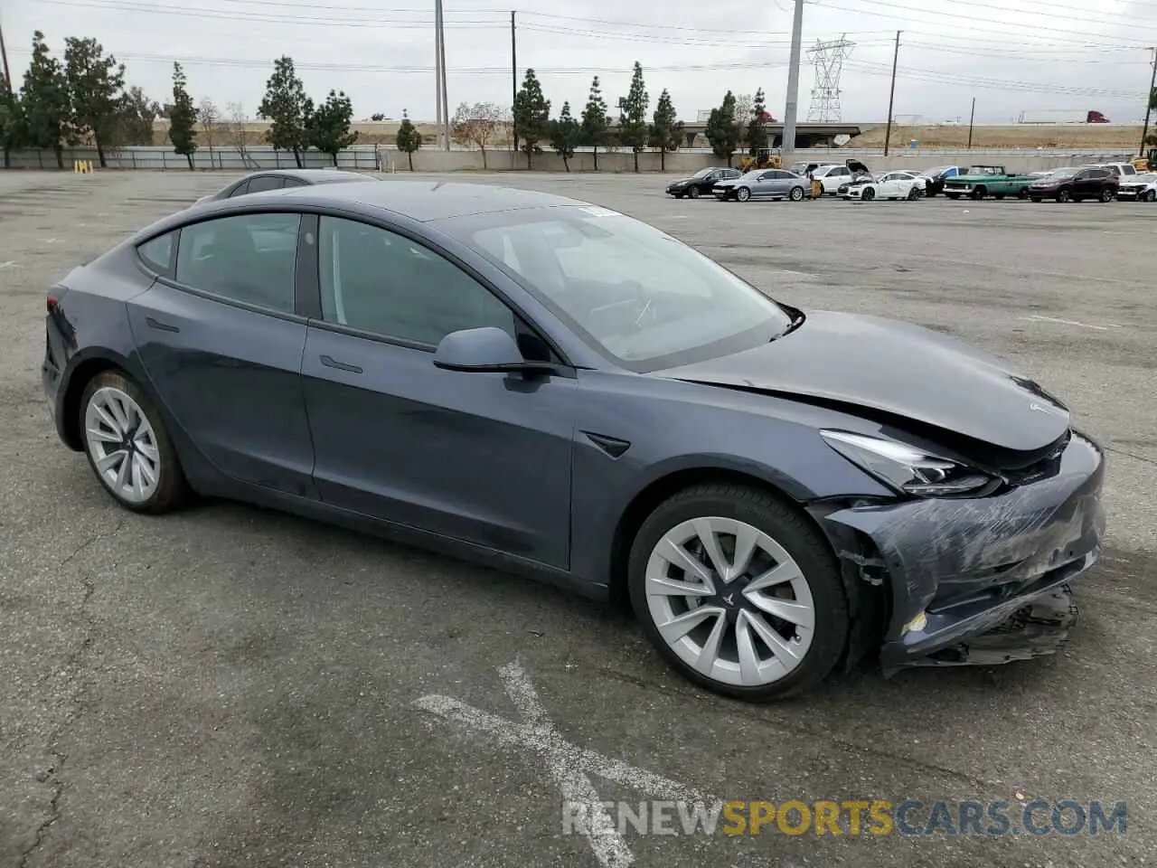 4 Photograph of a damaged car 5YJ3E1EB7NF131613 TESLA MODEL 3 2022