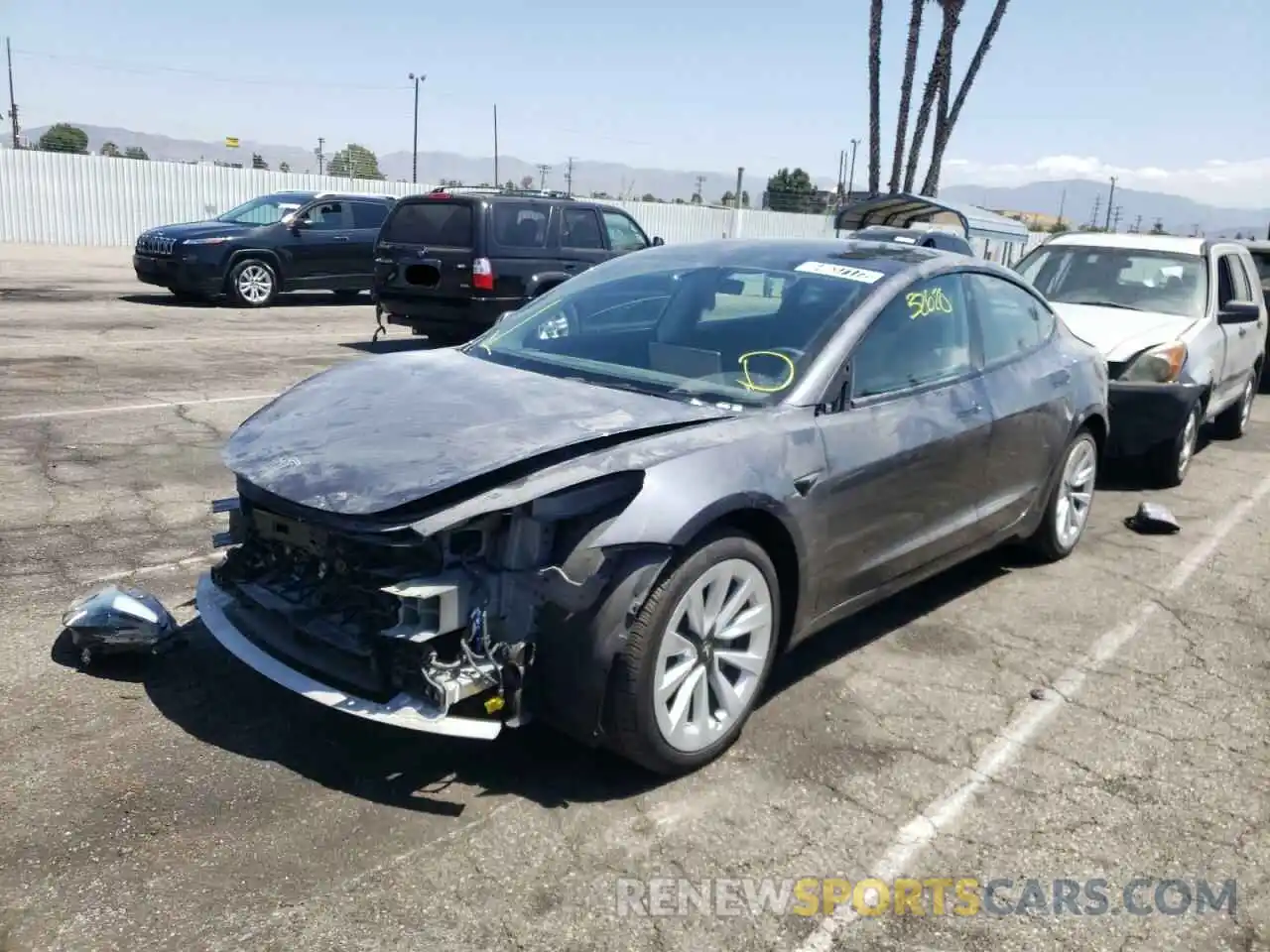 2 Photograph of a damaged car 5YJ3E1EB7NF142787 TESLA MODEL 3 2022