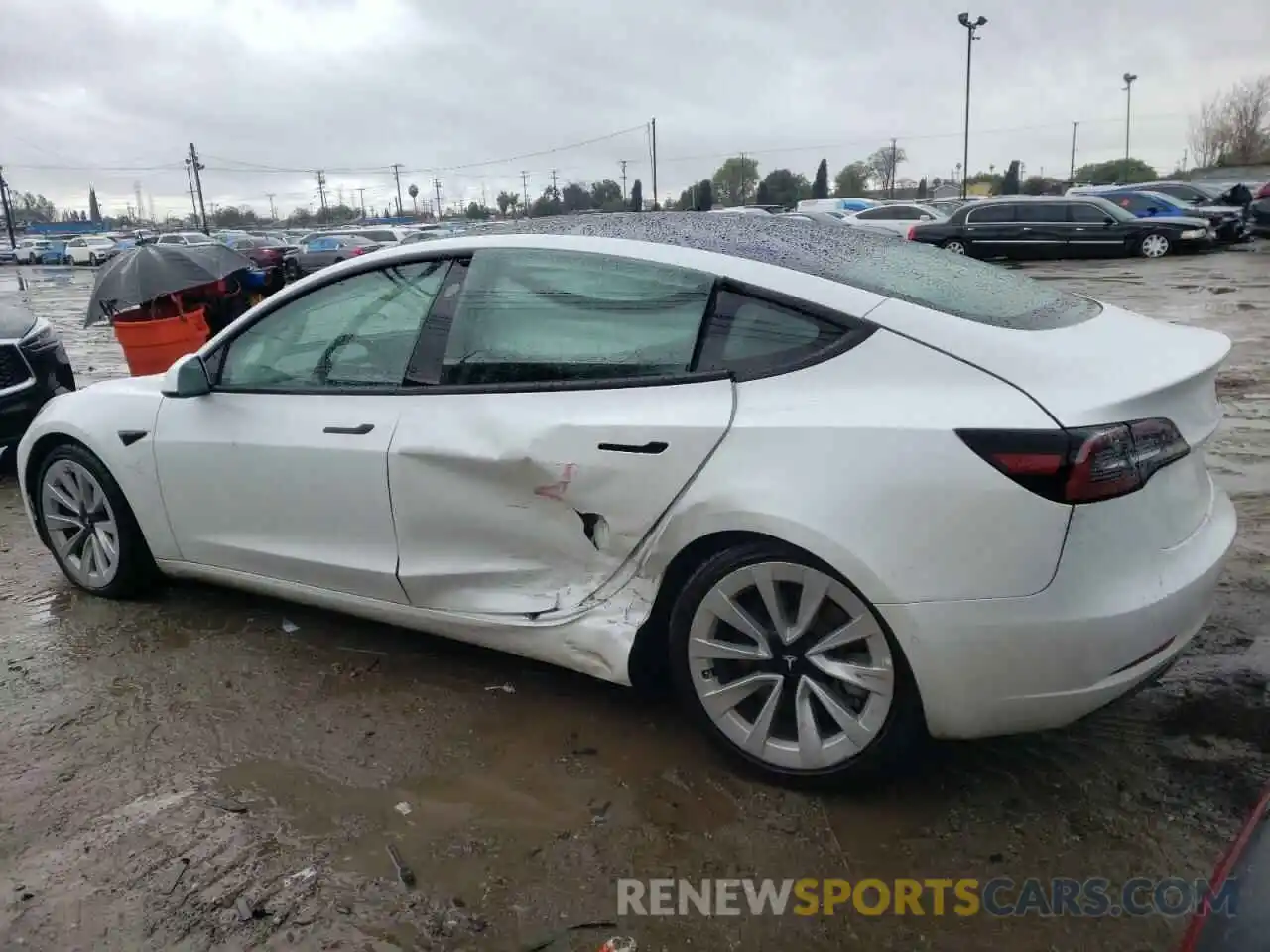 2 Photograph of a damaged car 5YJ3E1EB7NF143602 TESLA MODEL 3 2022