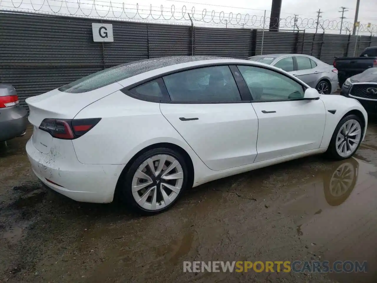 3 Photograph of a damaged car 5YJ3E1EB7NF143602 TESLA MODEL 3 2022