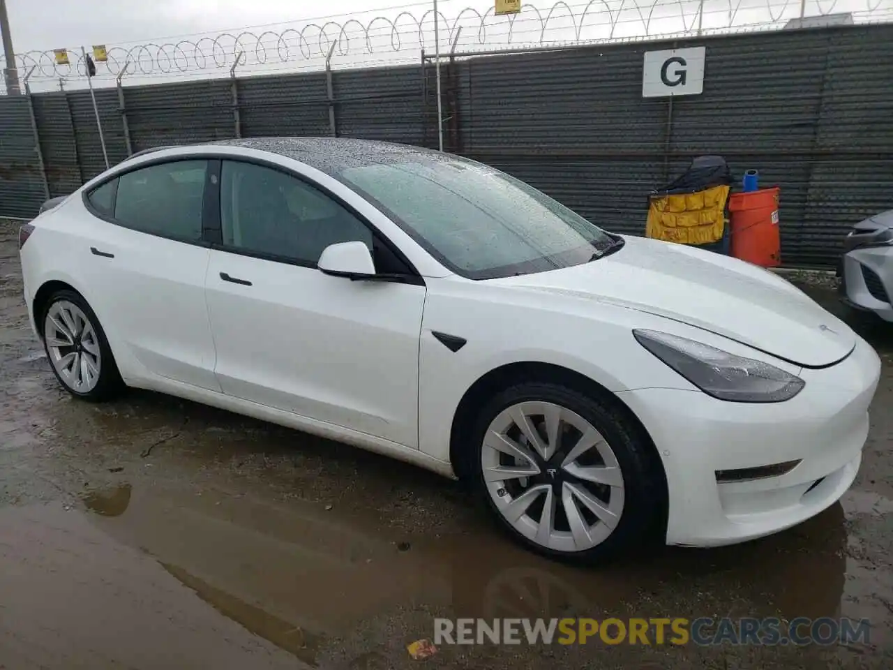 4 Photograph of a damaged car 5YJ3E1EB7NF143602 TESLA MODEL 3 2022