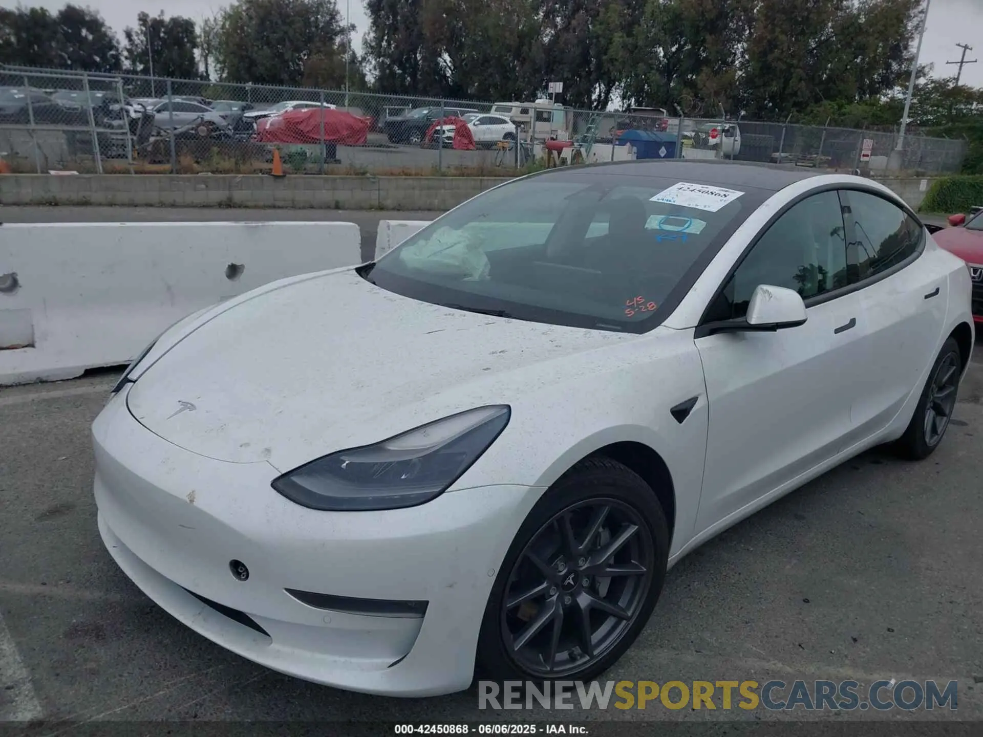 2 Photograph of a damaged car 5YJ3E1EB7NF170444 TESLA MODEL 3 2022