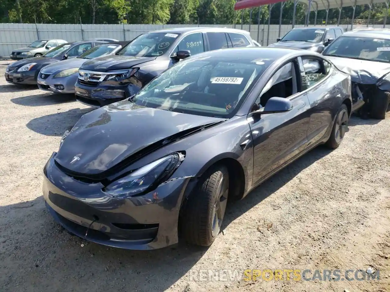 2 Photograph of a damaged car 5YJ3E1EB7NF176728 TESLA MODEL 3 2022