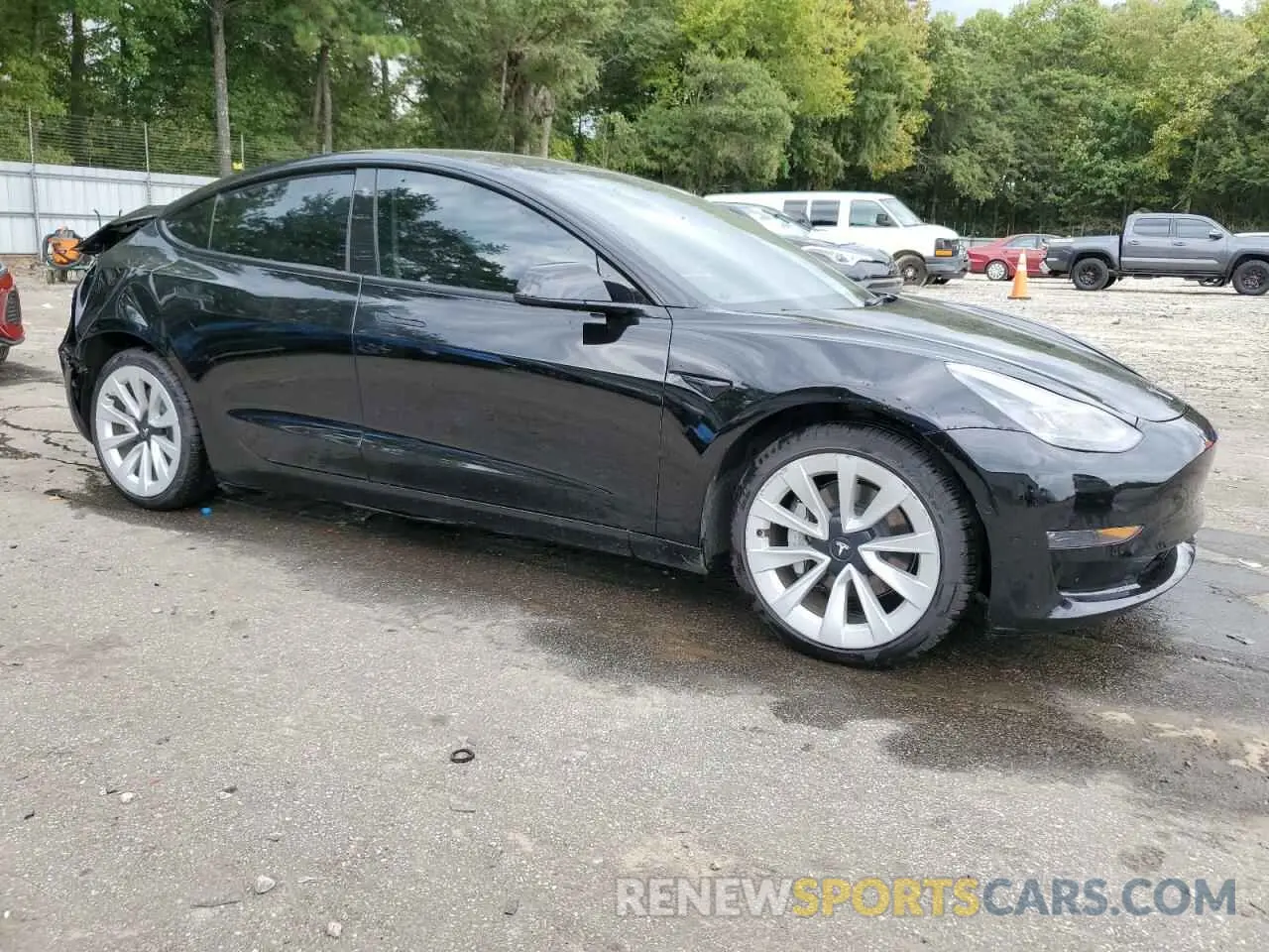 4 Photograph of a damaged car 5YJ3E1EB7NF179919 TESLA MODEL 3 2022