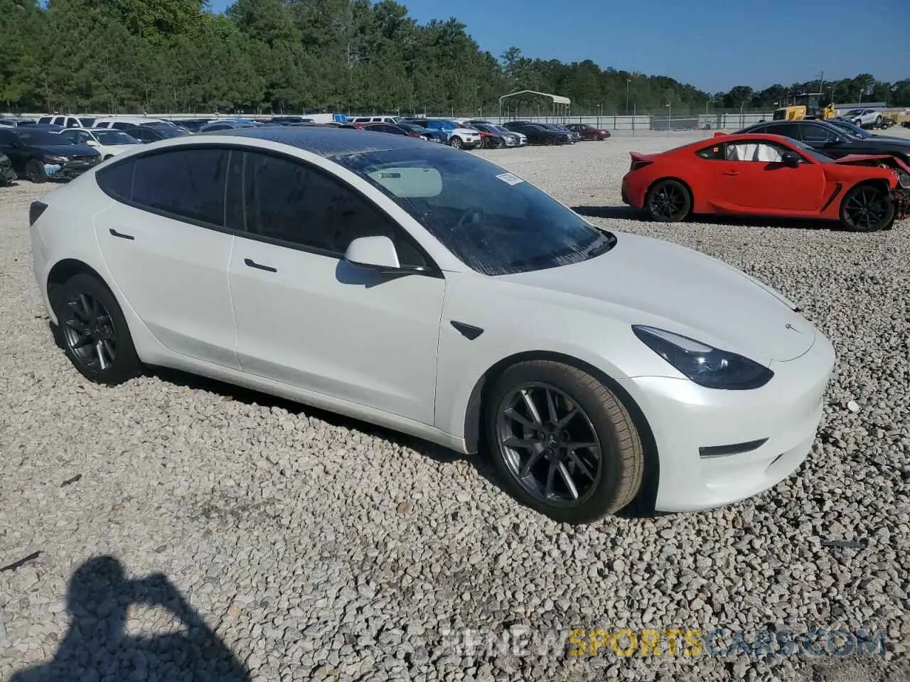 4 Photograph of a damaged car 5YJ3E1EB7NF184179 TESLA MODEL 3 2022