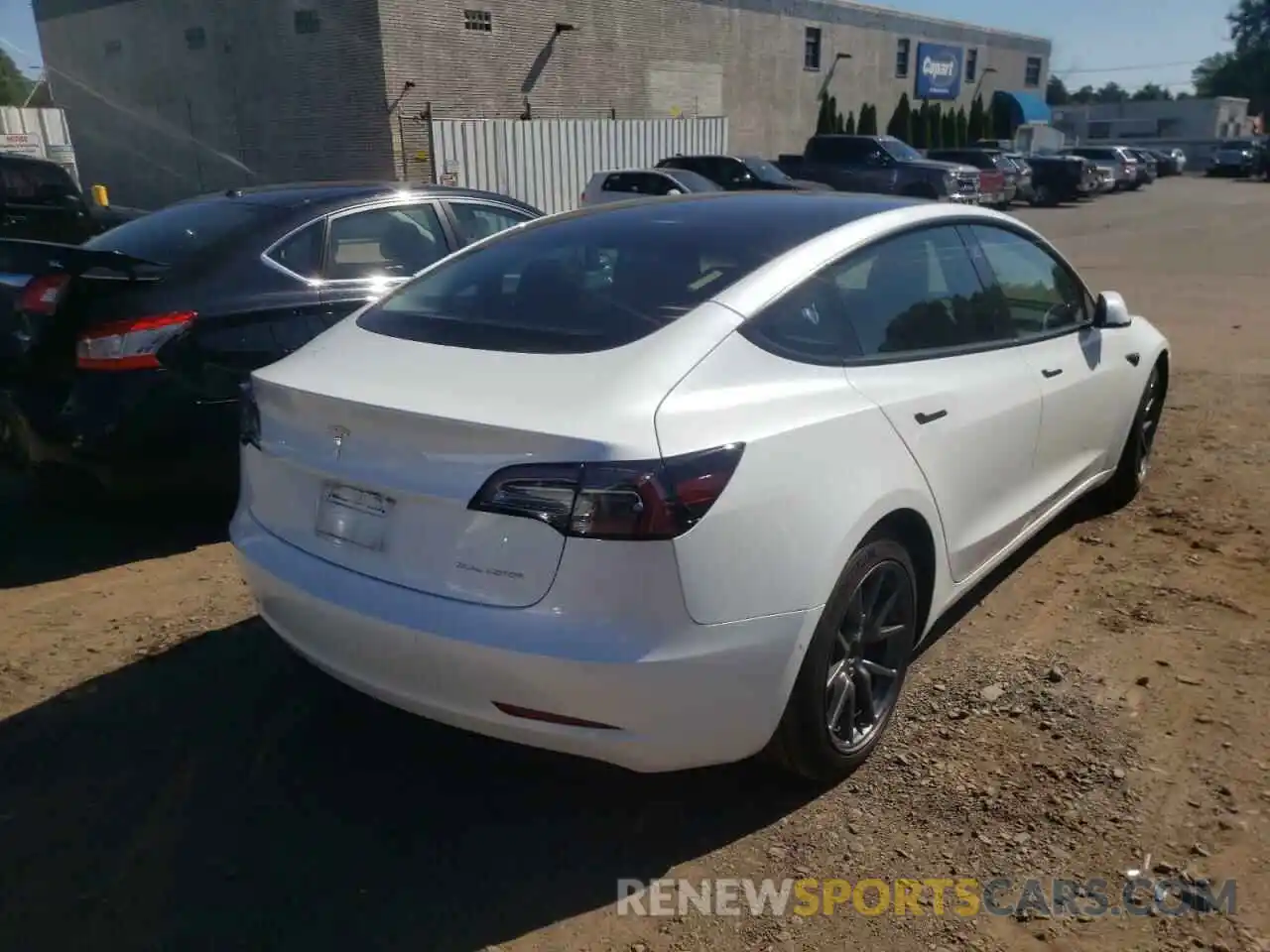 4 Photograph of a damaged car 5YJ3E1EB7NF191696 TESLA MODEL 3 2022