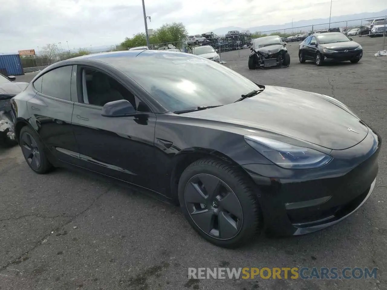 4 Photograph of a damaged car 5YJ3E1EB7NF195425 TESLA MODEL 3 2022