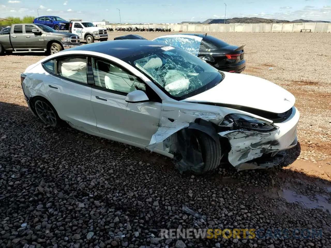 4 Photograph of a damaged car 5YJ3E1EB7NF228519 TESLA MODEL 3 2022