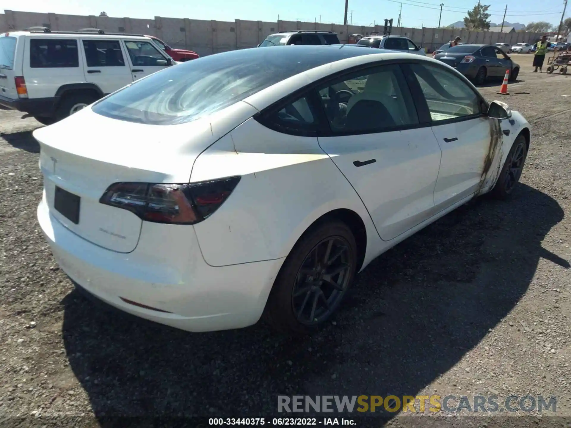 4 Photograph of a damaged car 5YJ3E1EB7NF228522 TESLA MODEL 3 2022