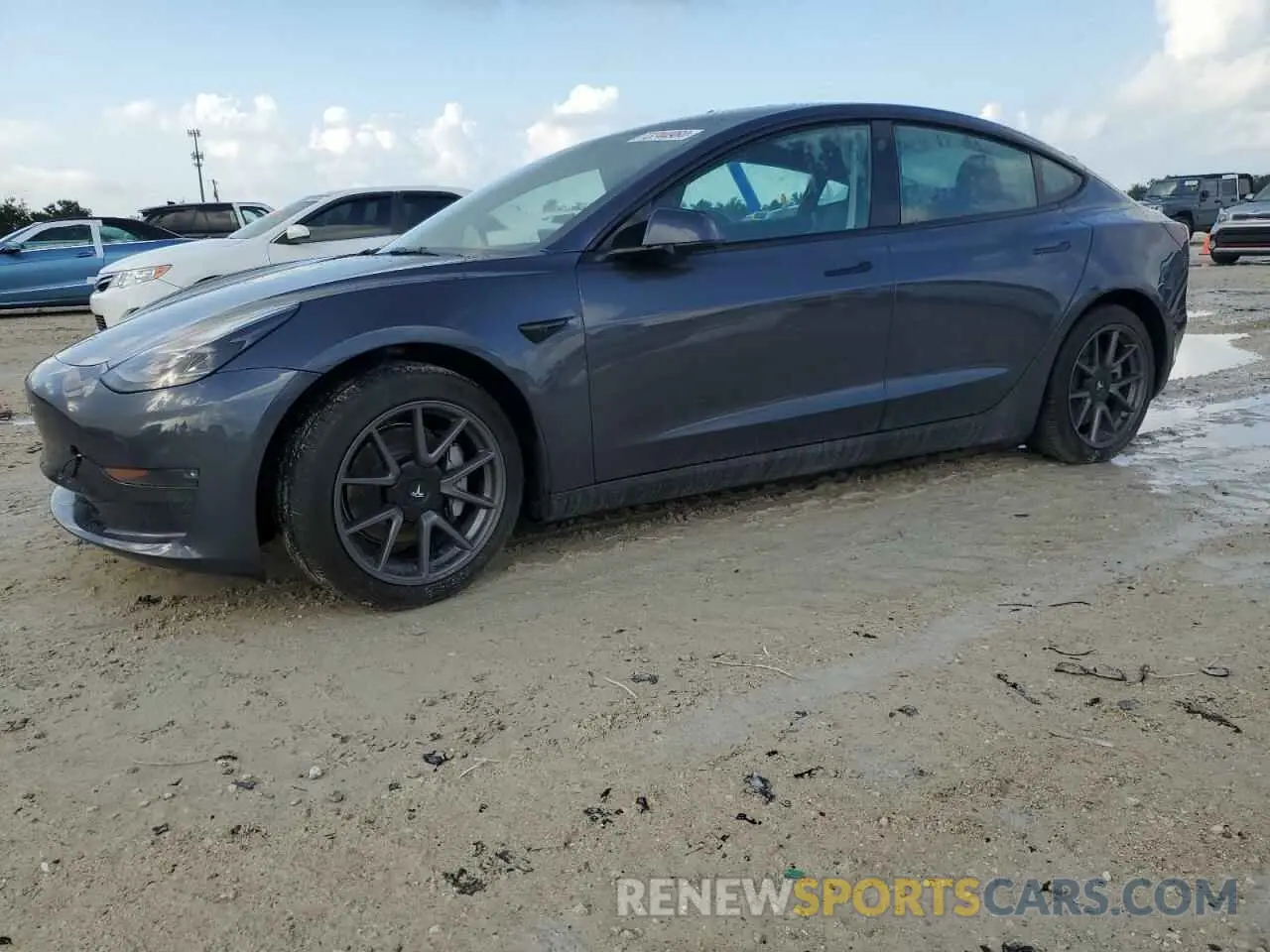 1 Photograph of a damaged car 5YJ3E1EB7NF233574 TESLA MODEL 3 2022