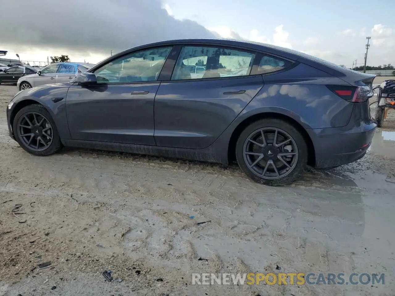 2 Photograph of a damaged car 5YJ3E1EB7NF233574 TESLA MODEL 3 2022
