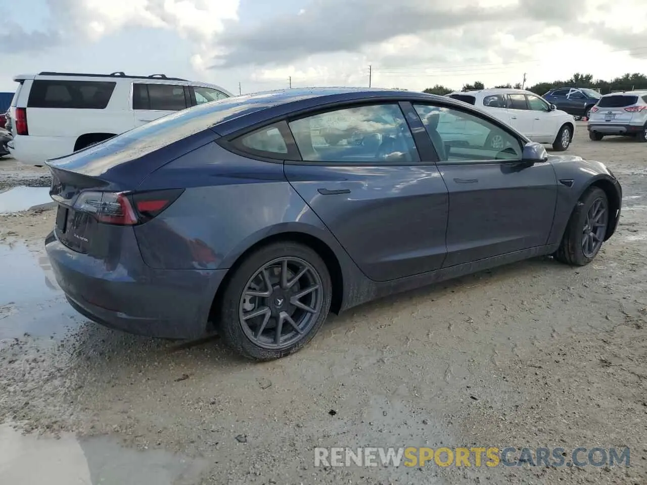 3 Photograph of a damaged car 5YJ3E1EB7NF233574 TESLA MODEL 3 2022