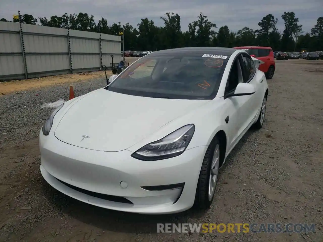 2 Photograph of a damaged car 5YJ3E1EB7NF258653 TESLA MODEL 3 2022