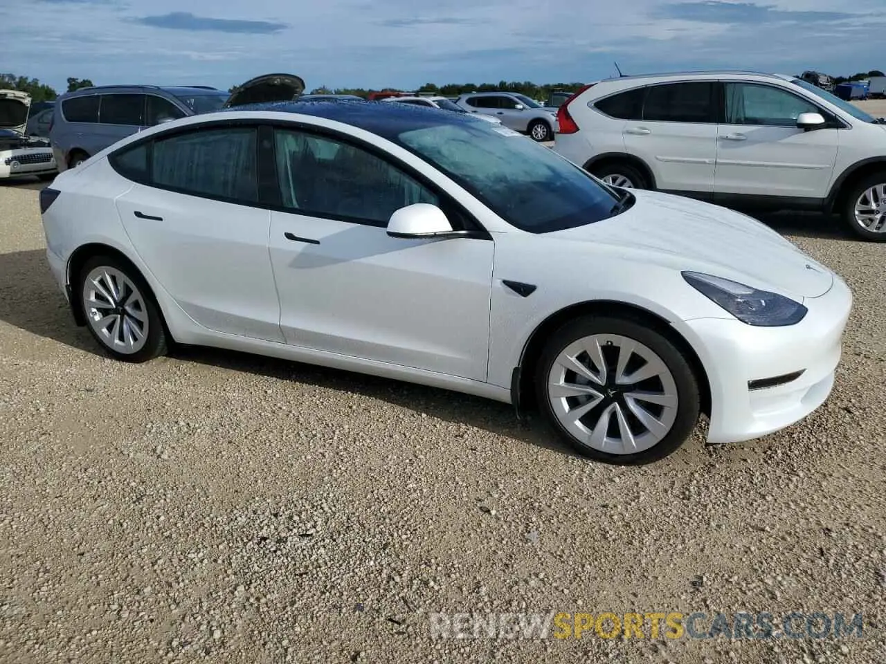 4 Photograph of a damaged car 5YJ3E1EB7NF276845 TESLA MODEL 3 2022