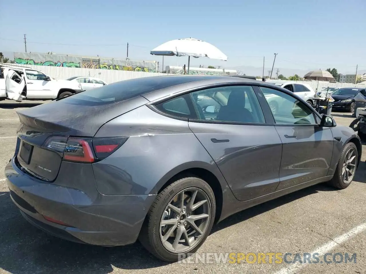 3 Photograph of a damaged car 5YJ3E1EB7NF277493 TESLA MODEL 3 2022