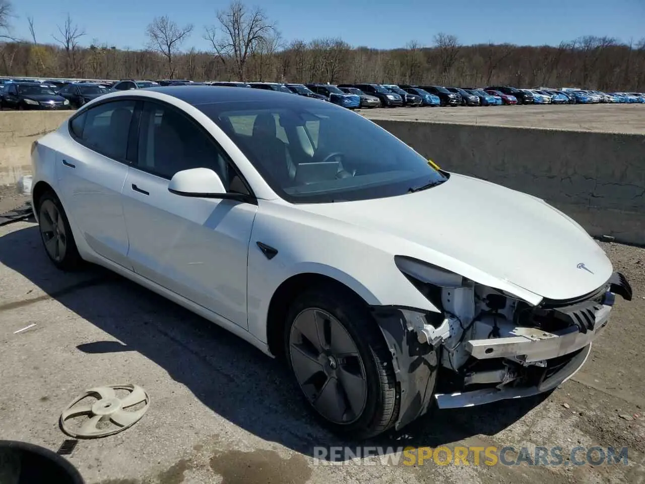 4 Photograph of a damaged car 5YJ3E1EB7NF341306 TESLA MODEL 3 2022