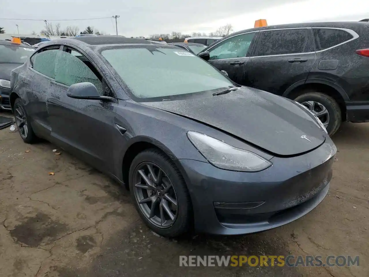 4 Photograph of a damaged car 5YJ3E1EB7NF349809 TESLA MODEL 3 2022