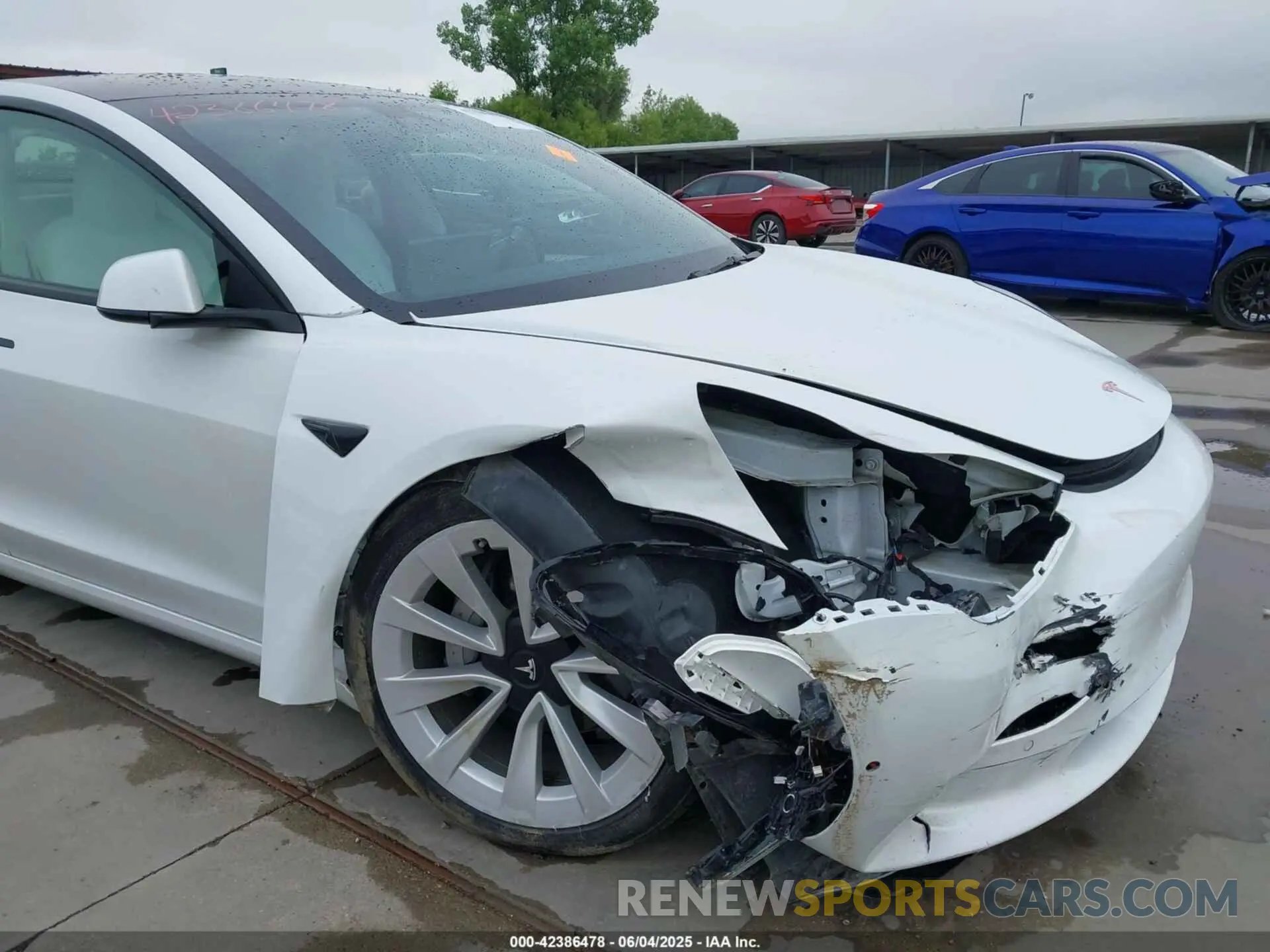 6 Photograph of a damaged car 5YJ3E1EB7NF355688 TESLA MODEL 3 2022